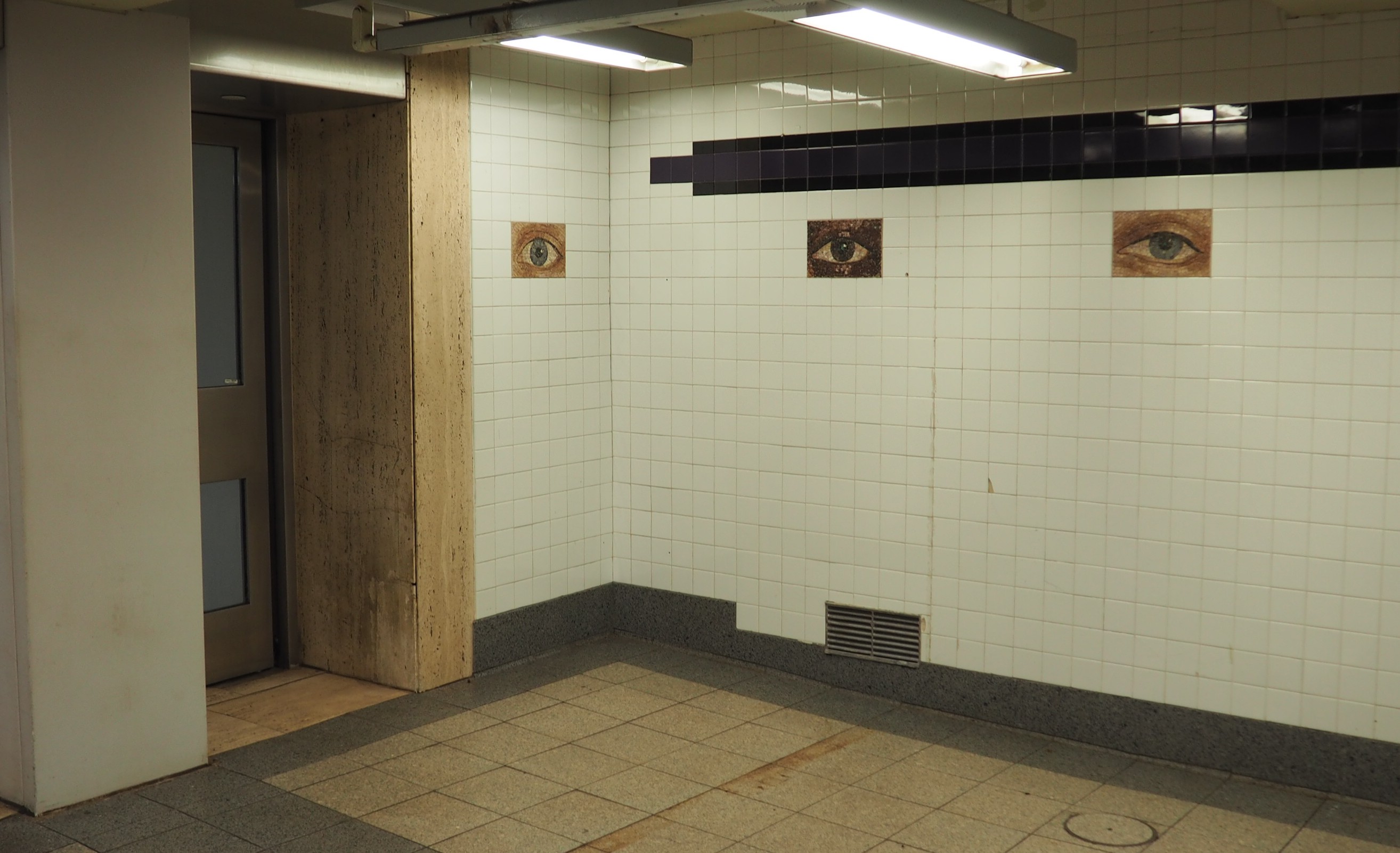 Mosaic eyes in New York World Trade Center Metro station, August 2025. Own picture.